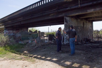HFD Battalion Chief Charlie Bedolla speaking with Hollister Mayor Ignacio Velazquez at the site of an early morning fire on April 2. Photo by Noe Magaña.